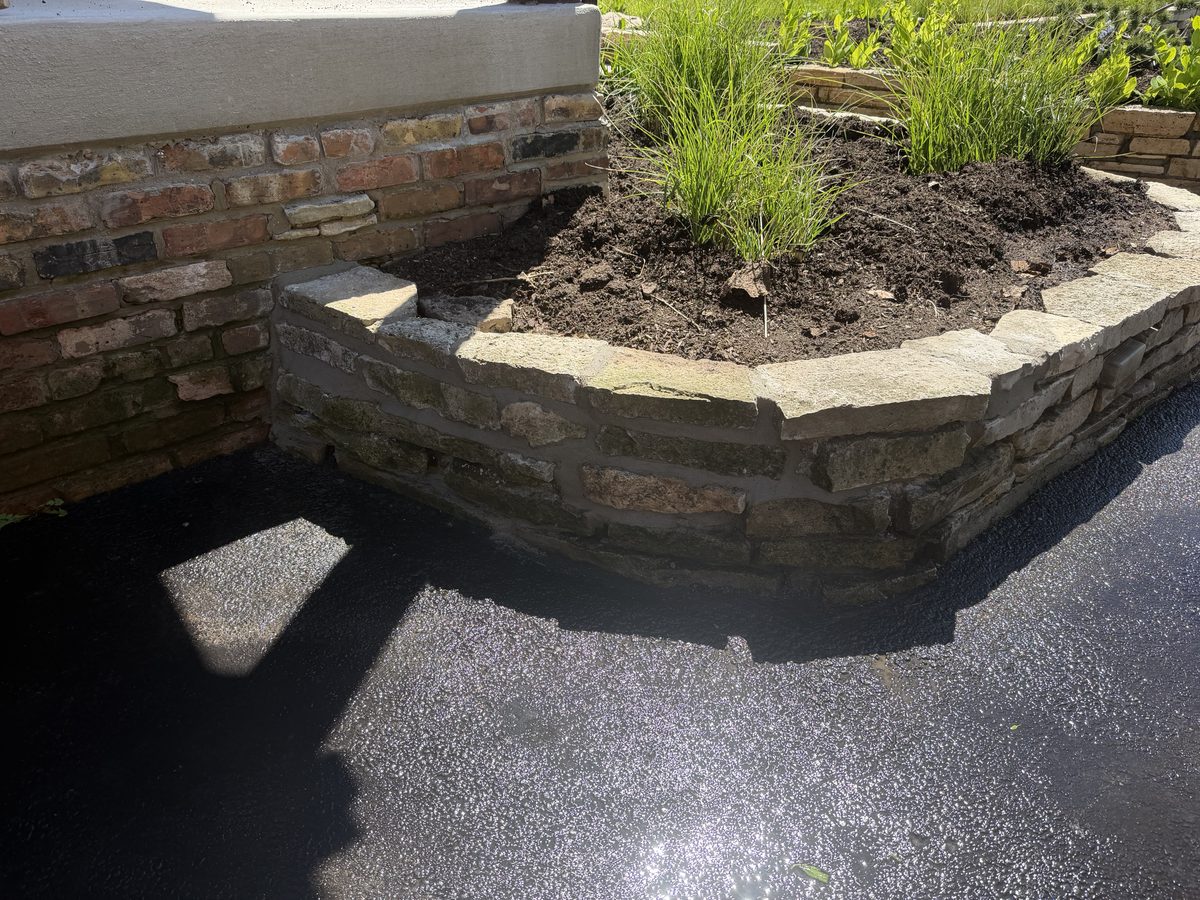 After — rebuilt solid retaining wall